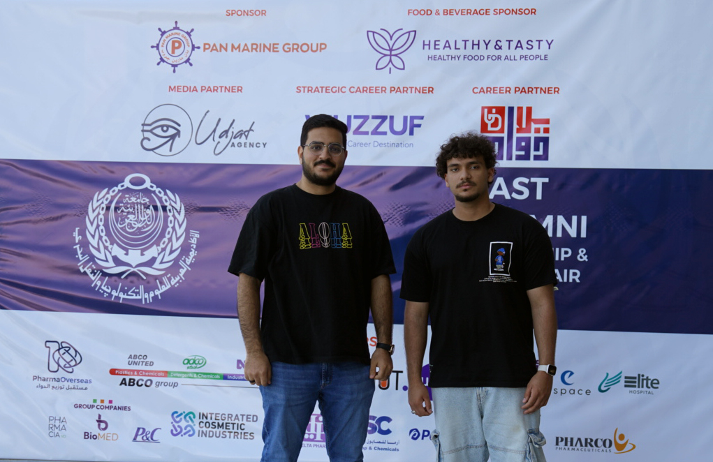 Two students staring to the camera in AAST Event