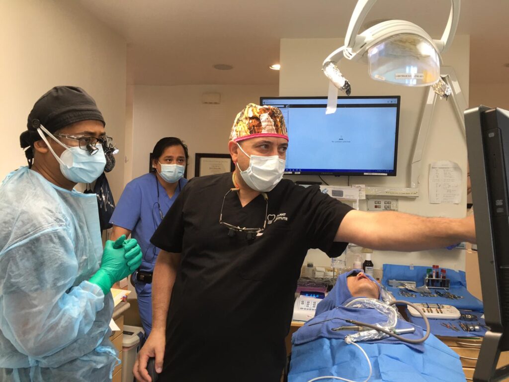 DR EHAB HANNA RWC Implant Club team
