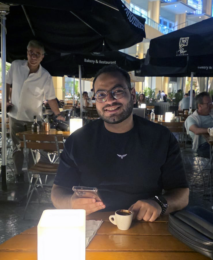 Ahmad El-Saeed profile picture - sitting in a restaurtant in Dubai Marina